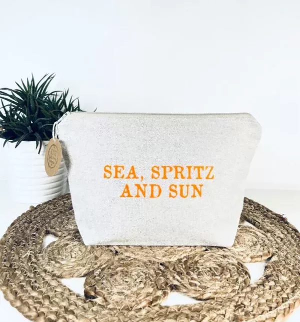 Grande pochette de maquillage en lurex avec slogan "Sea, Spritz and Sun" en orange fluo