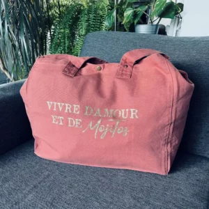 Sac fourre-tout vieux rose avec slogan "Vivre d'Amour et de Mojitos" en doré pailleté.